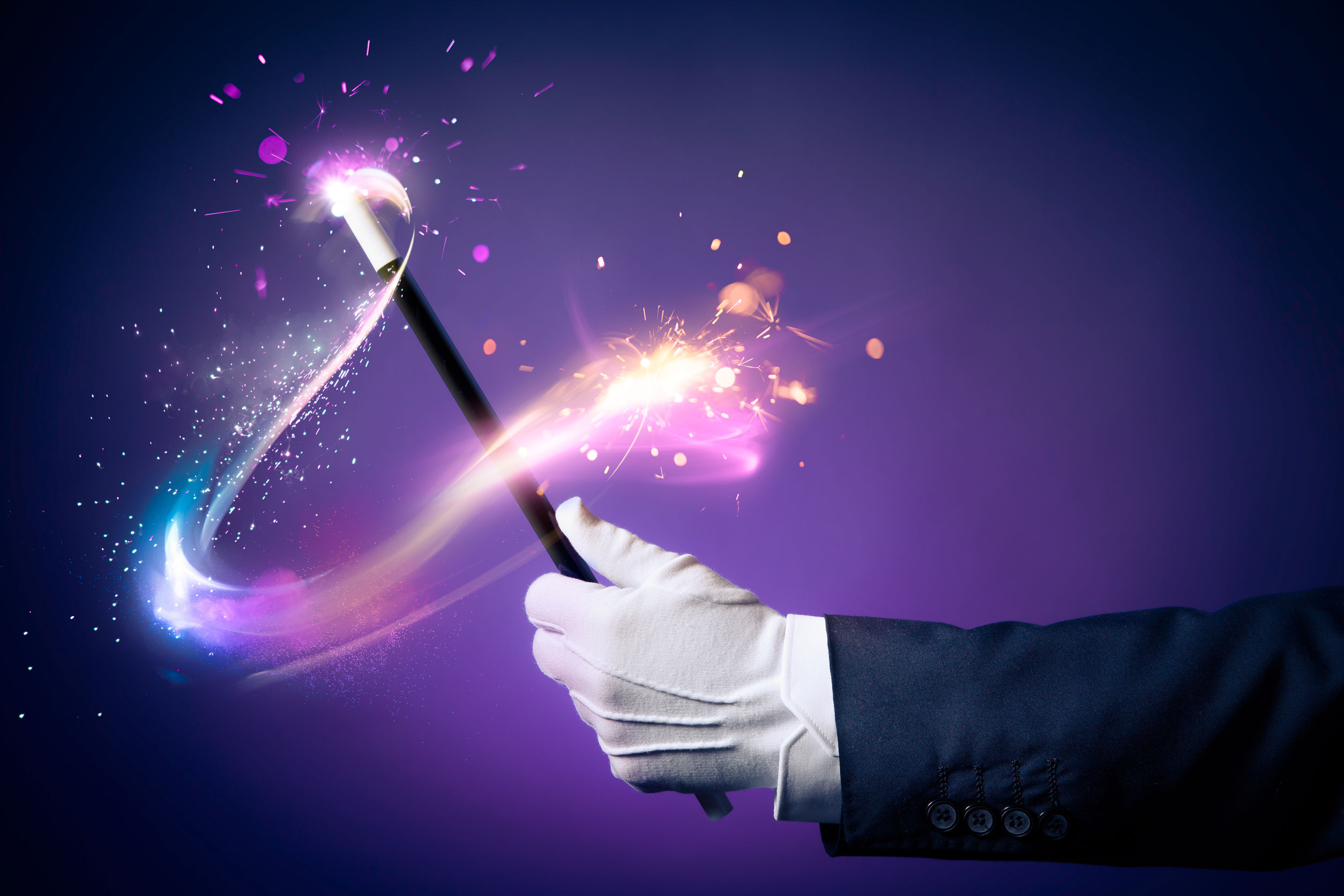 44405631 - magician hand with magic wand